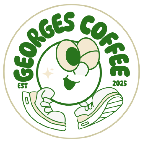 A circular logo-style graphic for Georges Coffee, featuring green text reading 'GEORGES COFFEE' around a cartoon coffee cup character with a bow tie, glasses, and a coffee cup illustration below, on a white background with a thin tan outer circle.