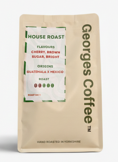 Georges Coffee package on a white background